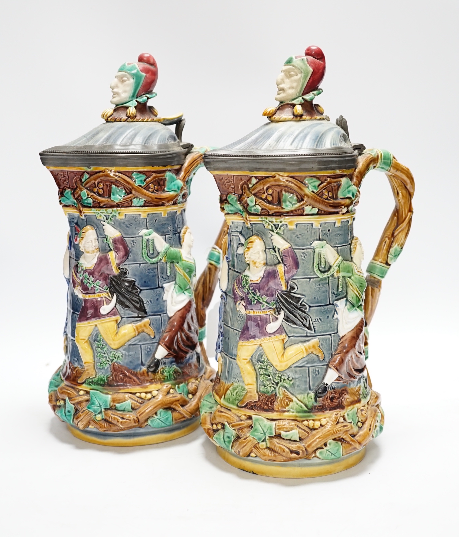 A pair of Victorian Minton majolica ‘Tower’ jugs, 33cm high